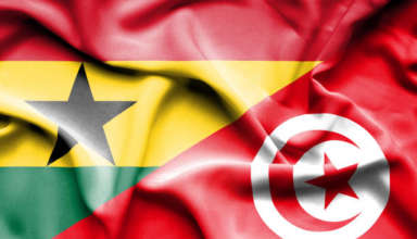 Waving flag of tunisia and ghana